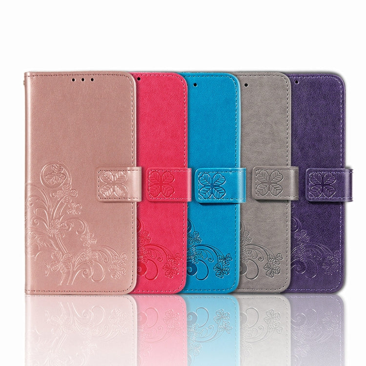 Four-leaf Clasp Embossed Buckle Mobile Phone Protection Leather Case with Lanyard & Card Slot & Wallet & Bracket Function, For Motorola E7 Power
