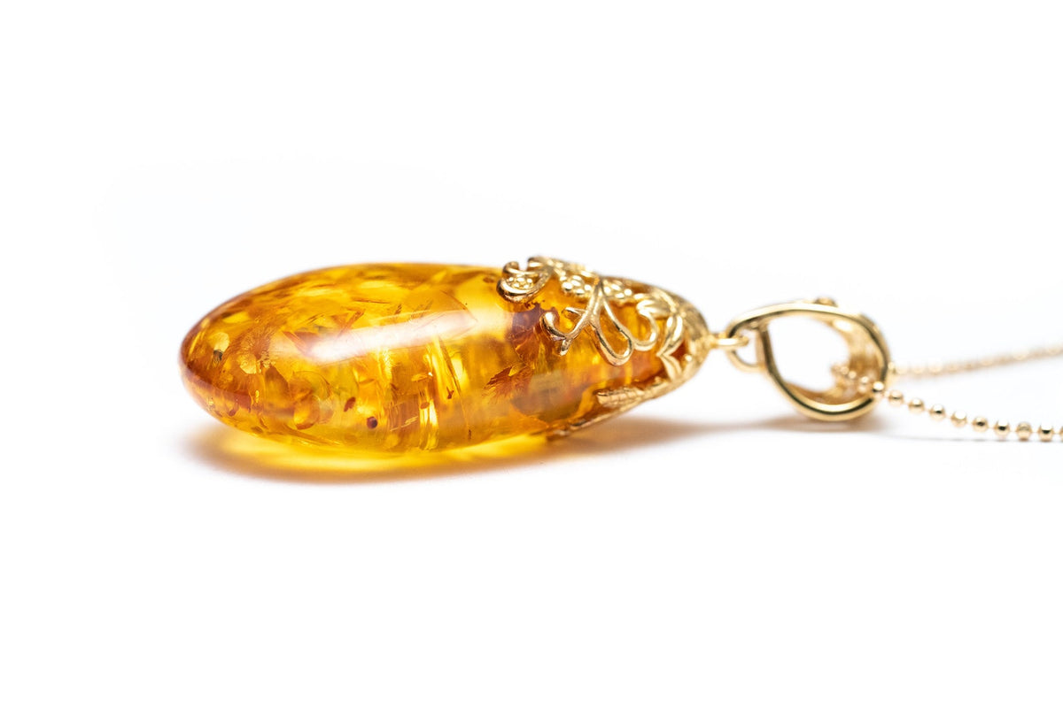 Gold Floral Accent Amber Droplet Pendant